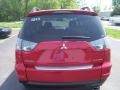 2010 Rally Red Metallic Mitsubishi Outlander SE 4WD  photo #10