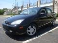 2001 Pitch Black Ford Focus SE Sedan  photo #1