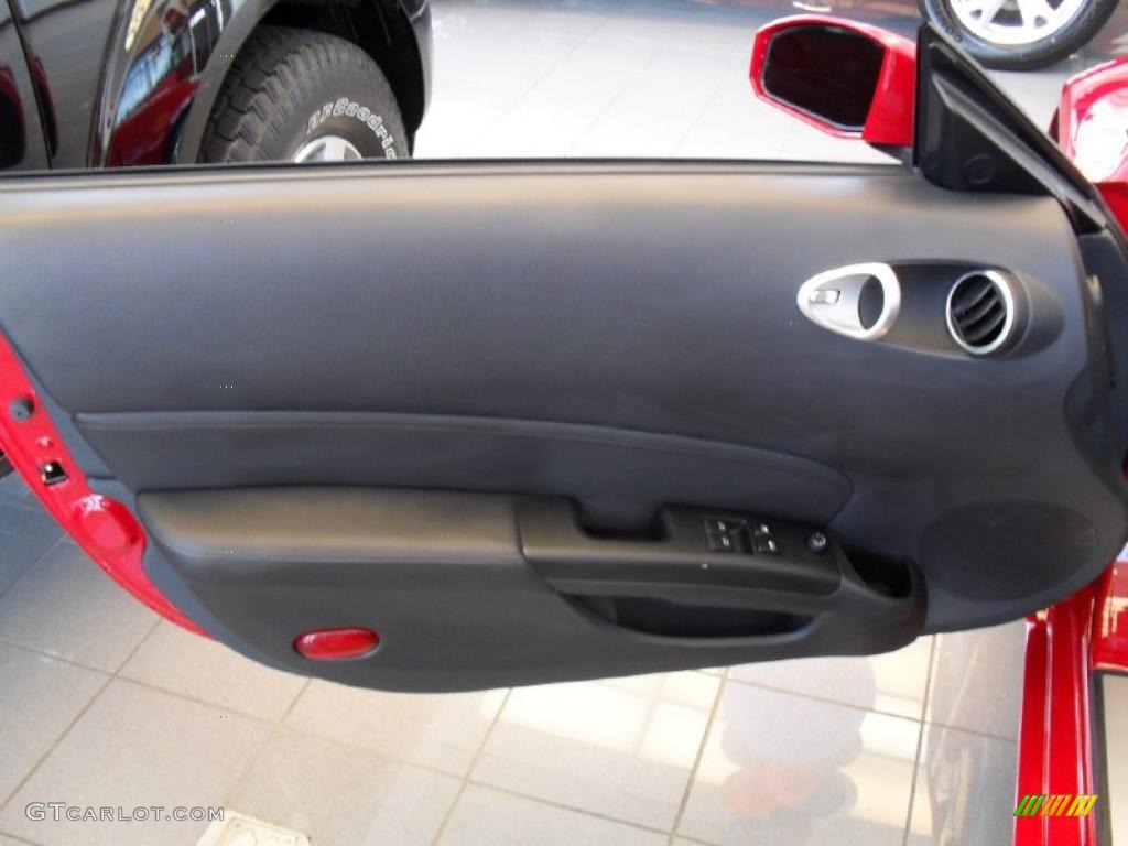 2006 Nissan 350Z Enthusiast Roadster Carbon Black Door Panel Photo #30441541