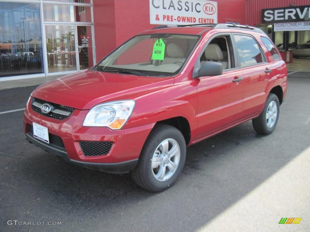 2010 Sportage LX - Volcanic Red / Beige photo #1