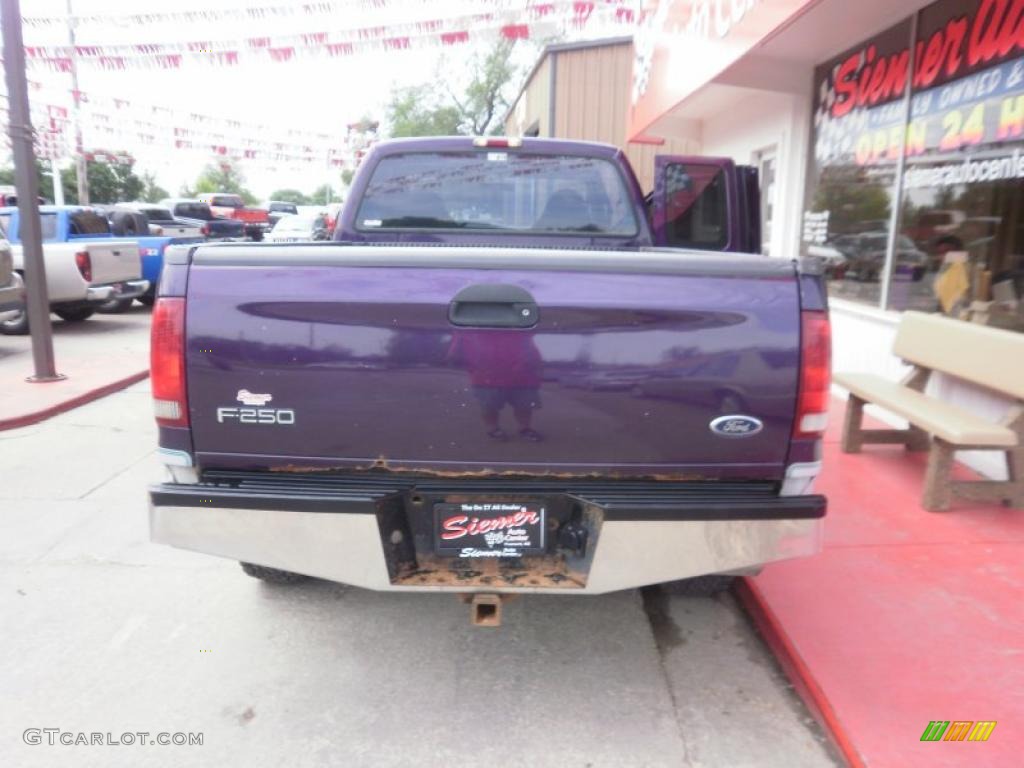 1999 F250 Super Duty XLT Extended Cab 4x4 - Thistle Purple Pearl / Medium Graphite photo #25