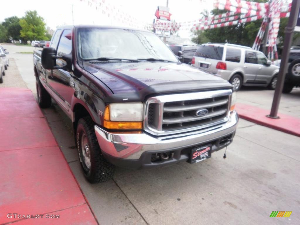 1999 F250 Super Duty XLT Extended Cab 4x4 - Thistle Purple Pearl / Medium Graphite photo #27