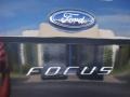 2010 Ebony Black Ford Focus SES Sedan  photo #4