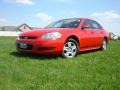 2010 Victory Red Chevrolet Impala LS  photo #1