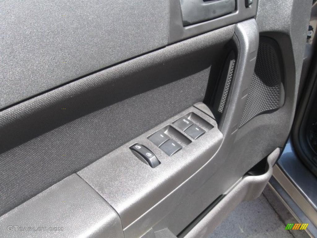 2010 Focus SE Sedan - Sterling Grey Metallic / Medium Stone photo #6