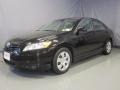 2009 Black Toyota Camry LE  photo #1