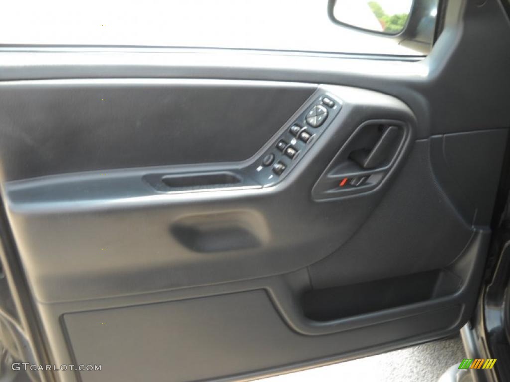 2004 Jeep Grand Cherokee Freedom Edition 4x4 Dark Slate Gray Door Panel Photo #30591496