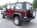 2010 Red Rock Crystal Pearl Jeep Wrangler Unlimited Sport 4x4  photo #2