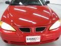 2000 Bright Red Pontiac Grand Am SE Sedan  photo #11
