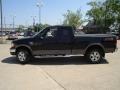 2002 Black Ford F150 FX4 SuperCab 4x4  photo #2