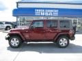 2007 Red Rock Crystal Pearl Jeep Wrangler Unlimited Sahara 4x4  photo #1
