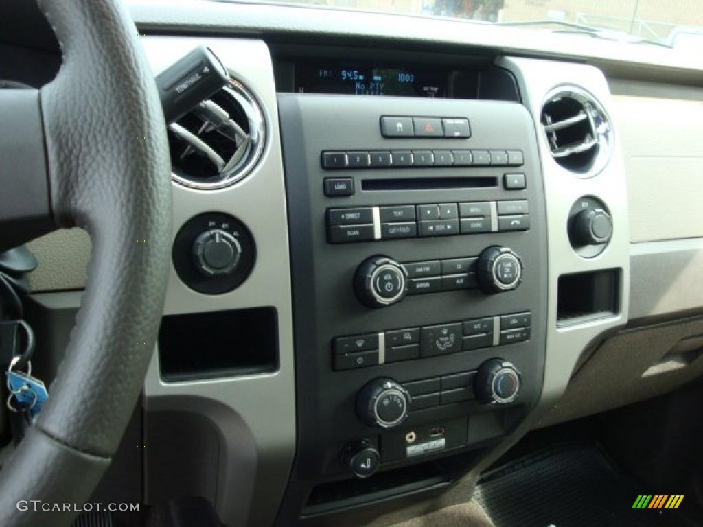 2010 F150 XLT SuperCab 4x4 - Dark Blue Pearl Metallic / Medium Stone photo #9