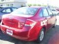 2010 Sangria Red Metallic Ford Focus SE Sedan  photo #2