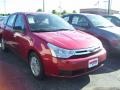 2010 Sangria Red Metallic Ford Focus SE Sedan  photo #3