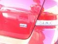 2010 Sangria Red Metallic Ford Focus SE Sedan  photo #6
