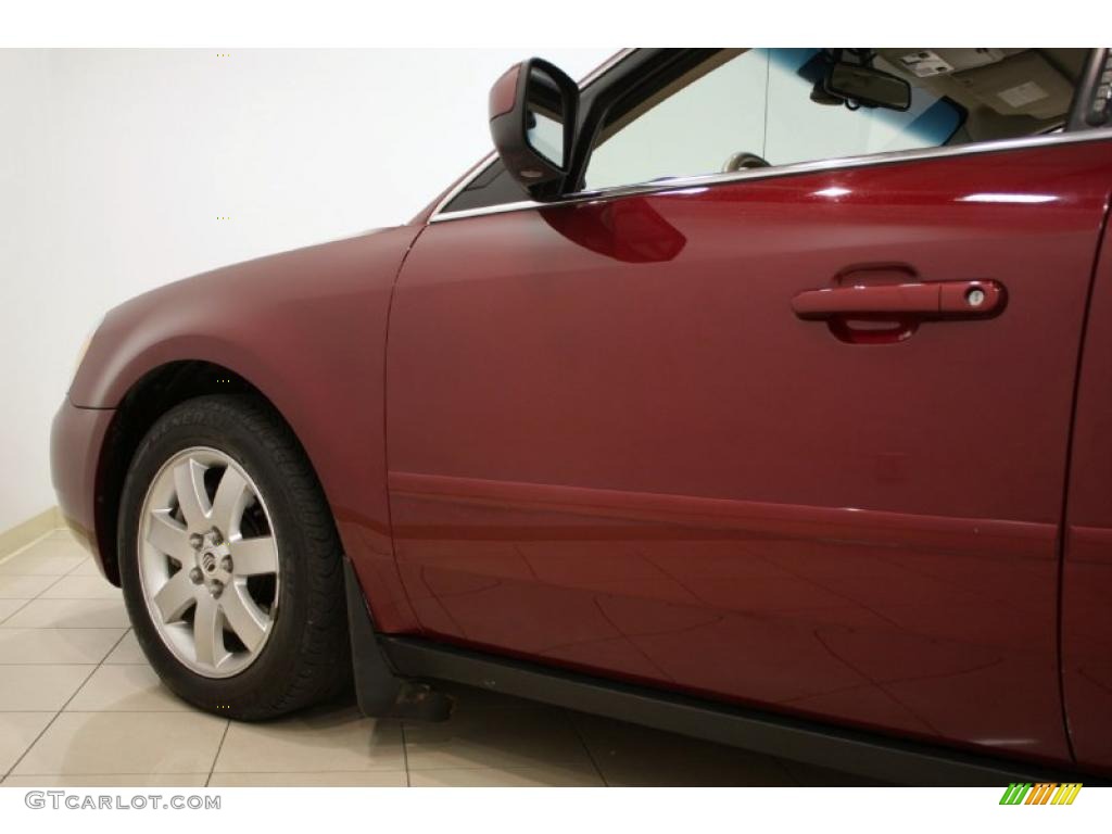 2006 Montego Luxury - Merlot Metallic / Pebble photo #24