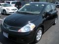 Super Black - Versa 1.8 SL Hatchback Photo No. 1