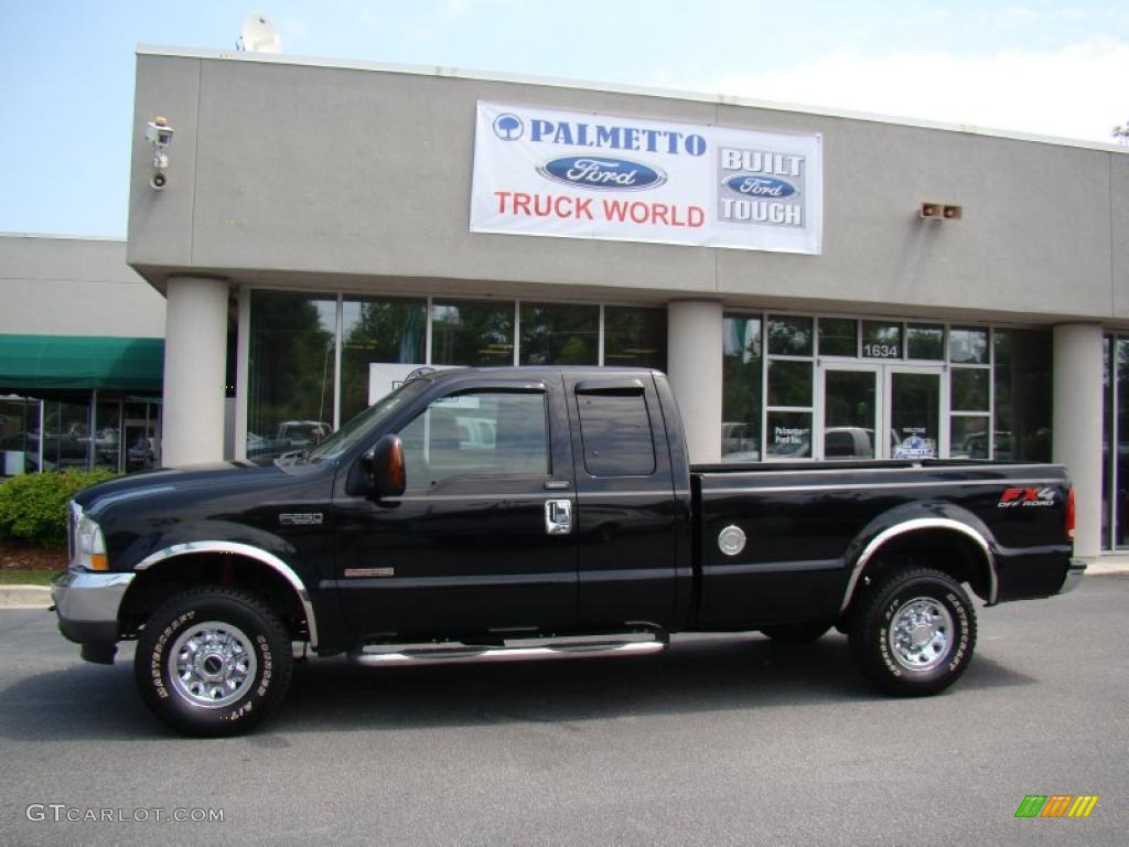 2004 F250 Super Duty FX4 SuperCab 4x4 - Black / Medium Flint photo #1