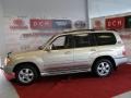 2004 Sonora Gold Pearl Toyota Land Cruiser   photo #4