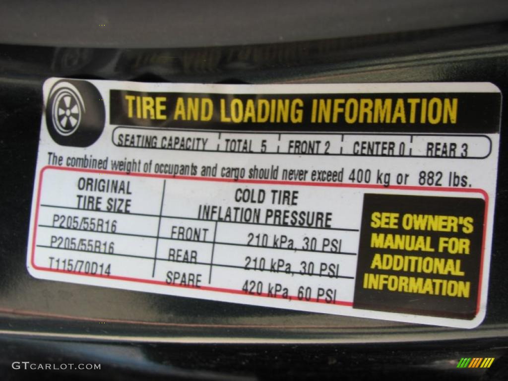 2004 Cavalier Sedan - Dark Green Metallic / Graphite photo #15