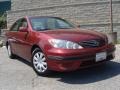 2005 Salsa Red Pearl Toyota Camry LE  photo #1