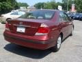 2005 Salsa Red Pearl Toyota Camry LE  photo #9