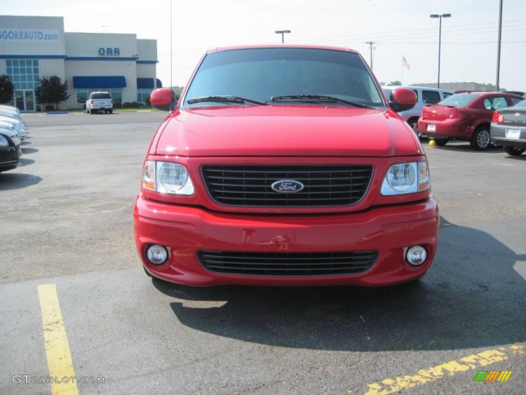 2004 F150 SVT Lightning - Bright Red / SVT Black/Light Flint photo #2