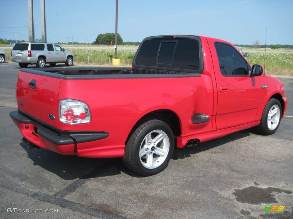 2004 F150 SVT Lightning - Bright Red / SVT Black/Light Flint photo #10