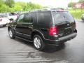 2004 Black Ford Explorer Limited 4x4  photo #7