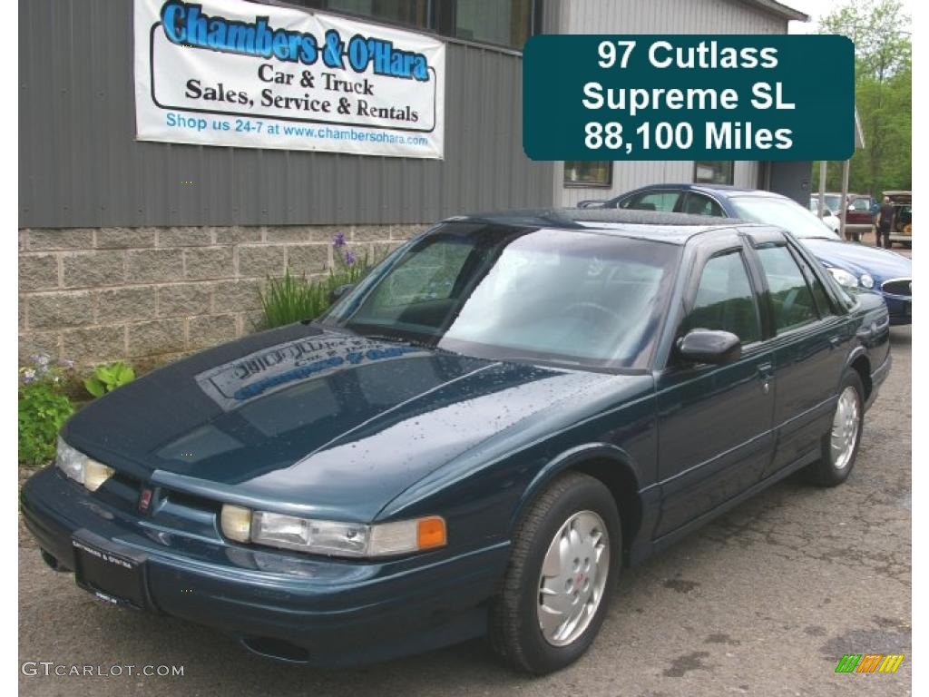 1997 Cutlass Supreme SL Sedan - Dark Teal Metallic / Graphite photo #1