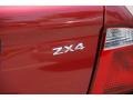 2005 Sangria Red Metallic Ford Focus ZX4 SE Sedan  photo #7