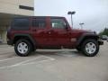 2010 Red Rock Crystal Pearl Jeep Wrangler Unlimited Sport 4x4  photo #2