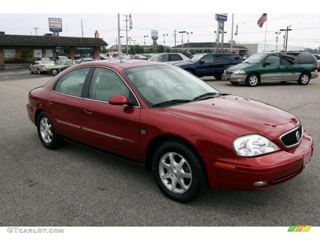 2000 Sable LS Premium Sedan - Toreador Red Metallic / Medium Parchment photo #1