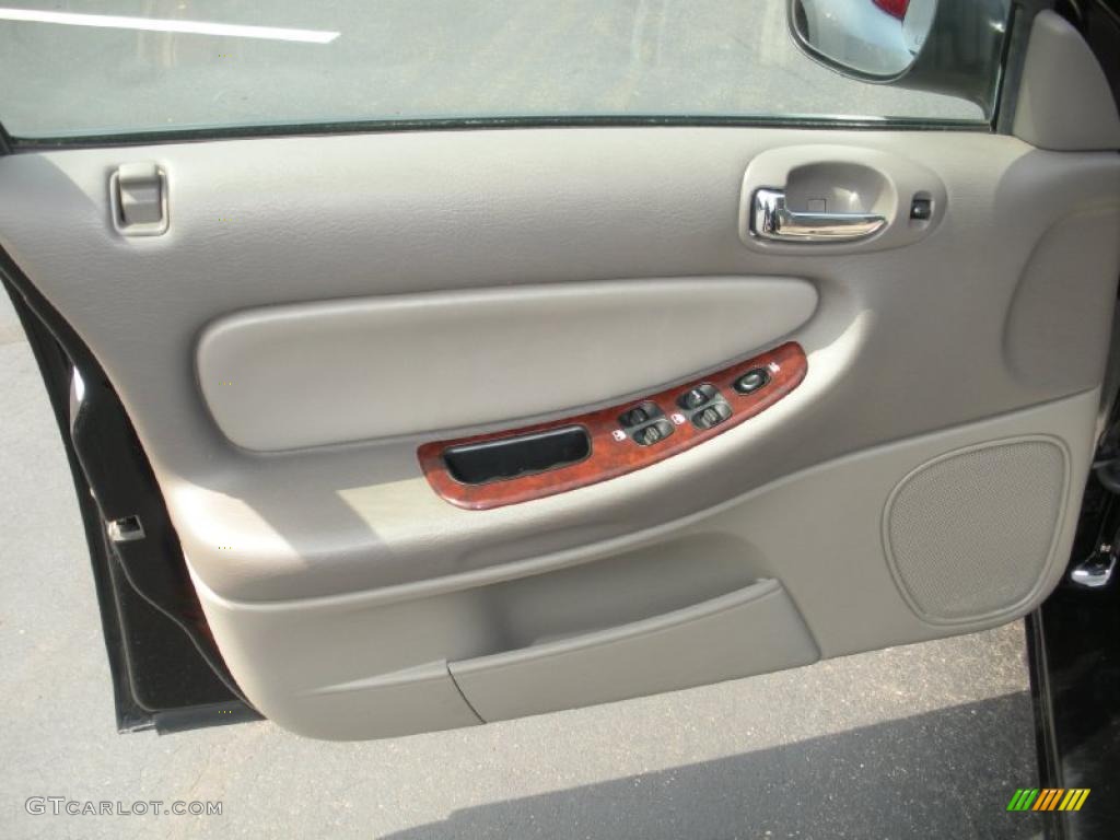 2002 Sebring LXi Sedan - Black / Sandstone photo #10