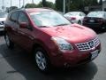 2009 Venom Red Nissan Rogue SL  photo #3