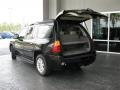 2006 Black Onyx GMC Envoy XL Denali 4x4  photo #8