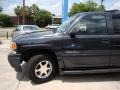 2003 Onyx Black GMC Yukon Denali AWD  photo #39