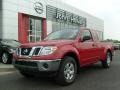 2009 Red Brick Nissan Frontier SE King Cab 4x4  photo #1