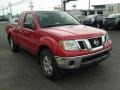 2009 Red Brick Nissan Frontier SE King Cab 4x4  photo #10