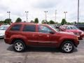 2007 Red Rock Crystal Pearl Jeep Grand Cherokee Laredo 4x4  photo #1