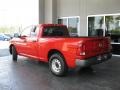 2010 Flame Red Dodge Ram 1500 ST Quad Cab  photo #5