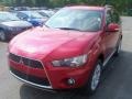 2010 Rally Red Metallic Mitsubishi Outlander SE 4WD  photo #1