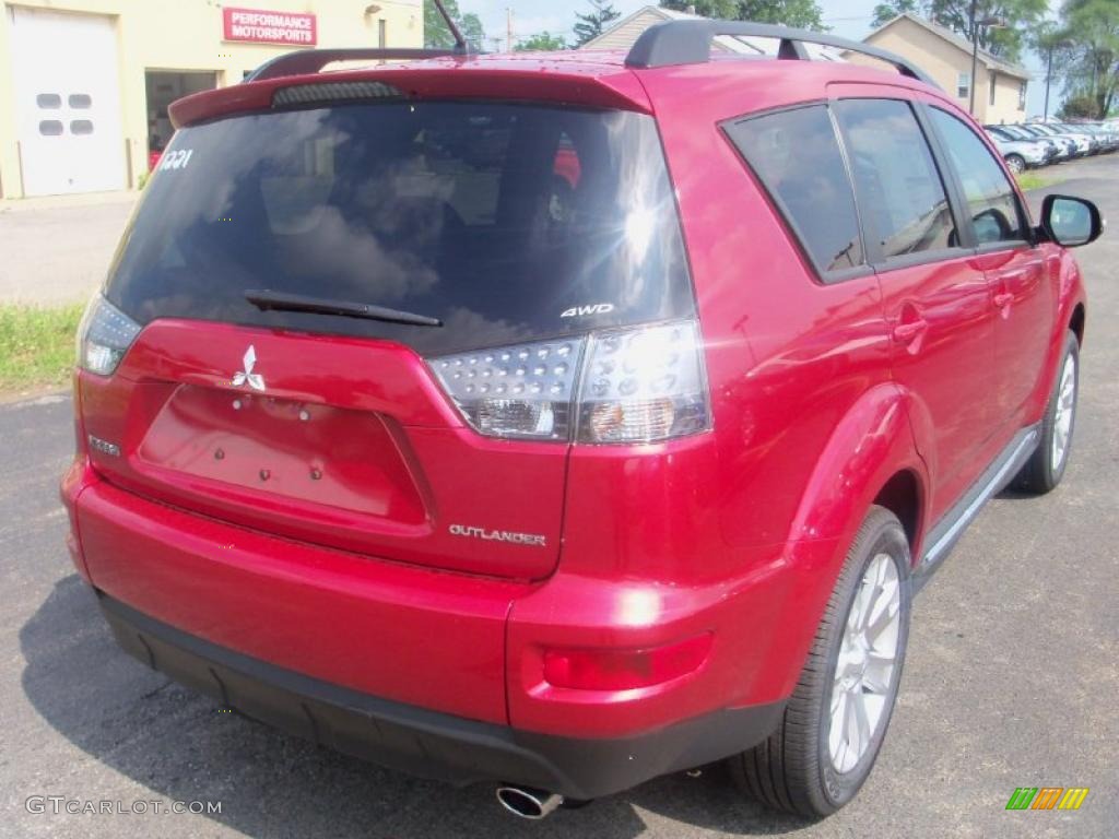2010 Outlander SE 4WD - Rally Red Metallic / Black photo #11