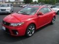 2010 Racing Red Kia Forte Koup SX  photo #1