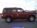 2009 Red Rock Crystal Pearl Jeep Liberty Sport 4x4  photo #14