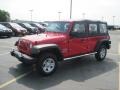 2010 Flame Red Jeep Wrangler Unlimited Sport 4x4  photo #1