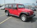 2010 Flame Red Jeep Wrangler Unlimited Sport 4x4  photo #3