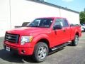 2010 Vermillion Red Ford F150 STX SuperCab 4x4  photo #1