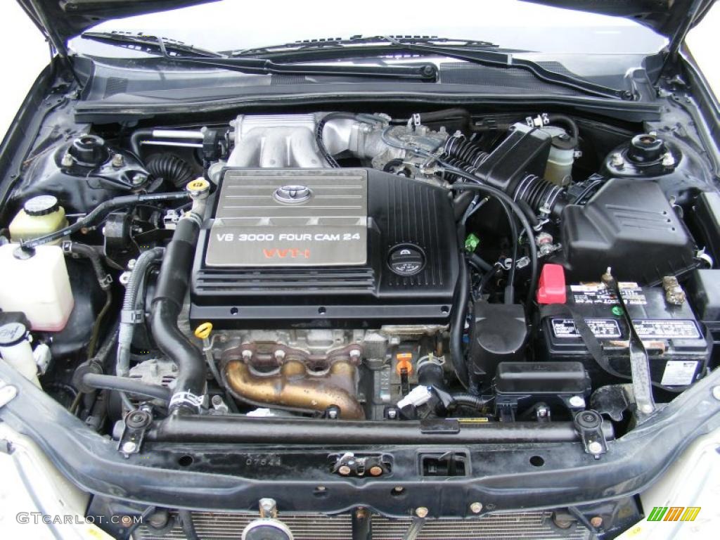 2002 Avalon XLS - Black / Ivory photo #28