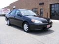 2004 Black Toyota Camry LE  photo #1